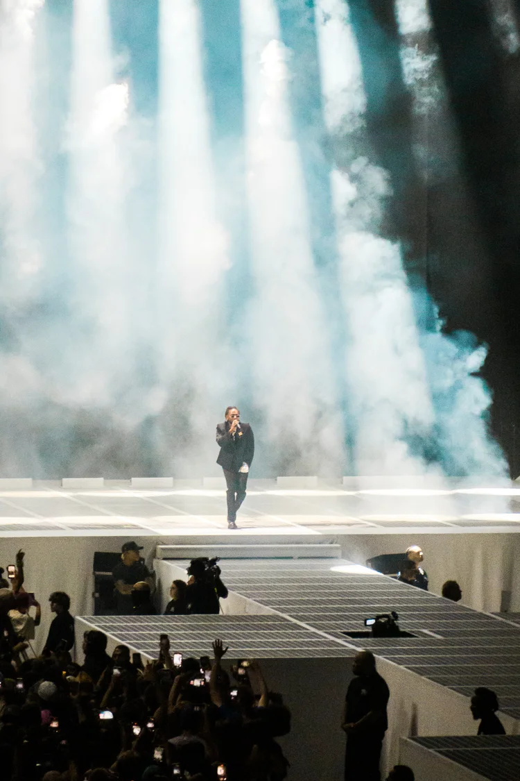 Performer with dramatic lighting and smoke