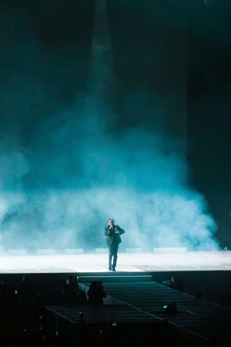 Performer with blue smoke