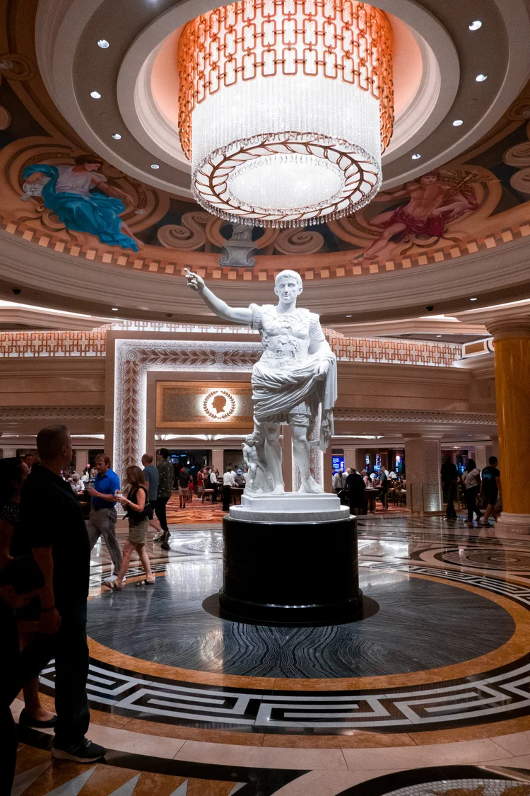 Grand hotel lobby with marble statue