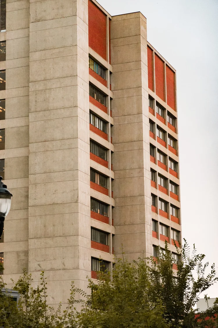 Concrete building with red accents