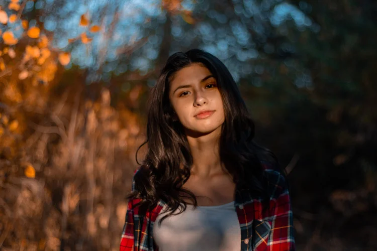 Young woman in a plaid shirt