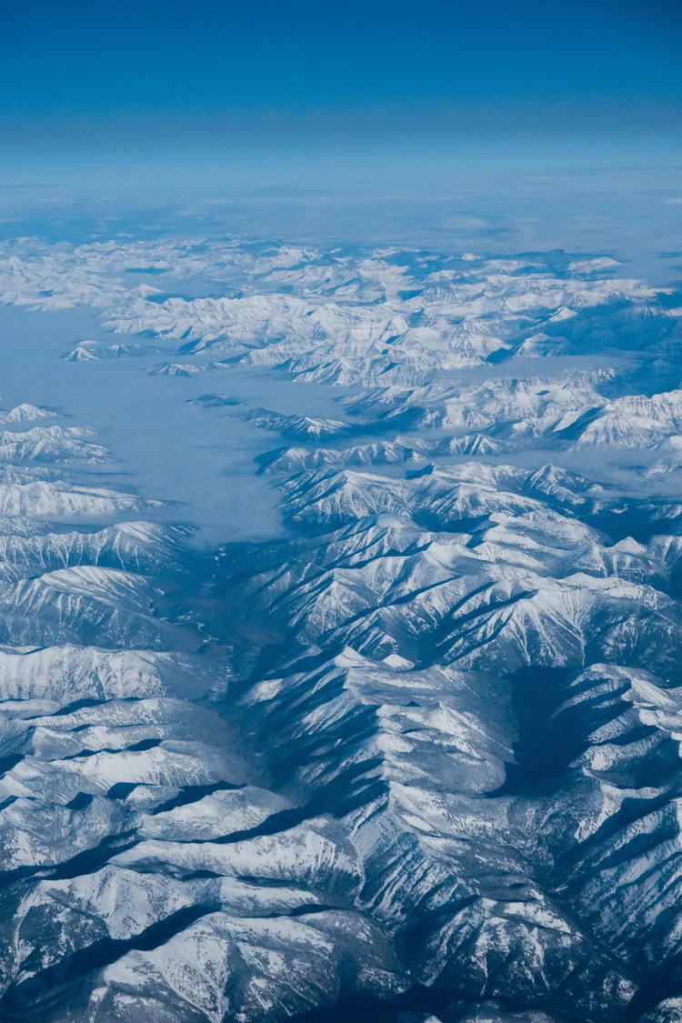 Snow-covered mountain range from the air
