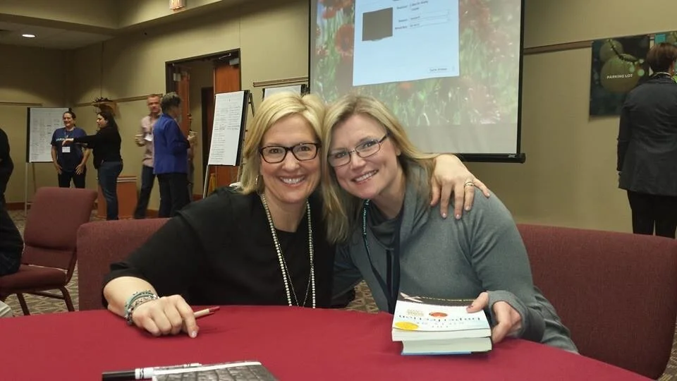 Brené Brown with her arm around Arianne Rice