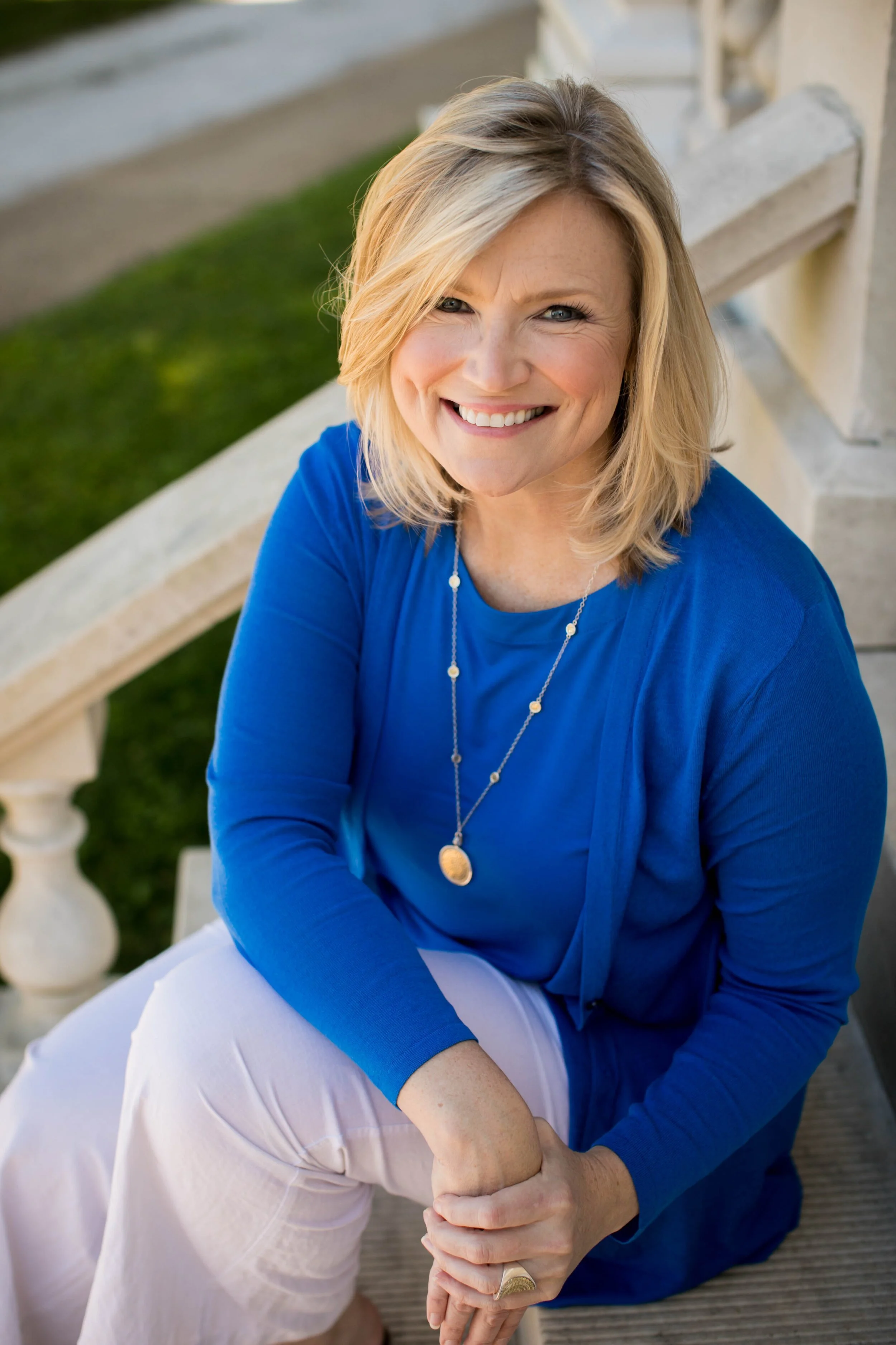 Arianne Rice, smiling looking up at the camera