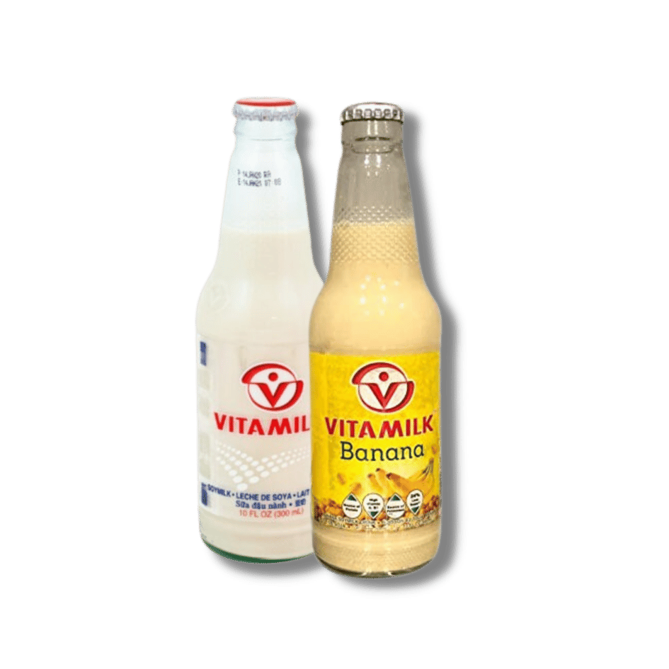 Two bottles of Vitamilk drinks, one plain and one banana flavor, against a black background.