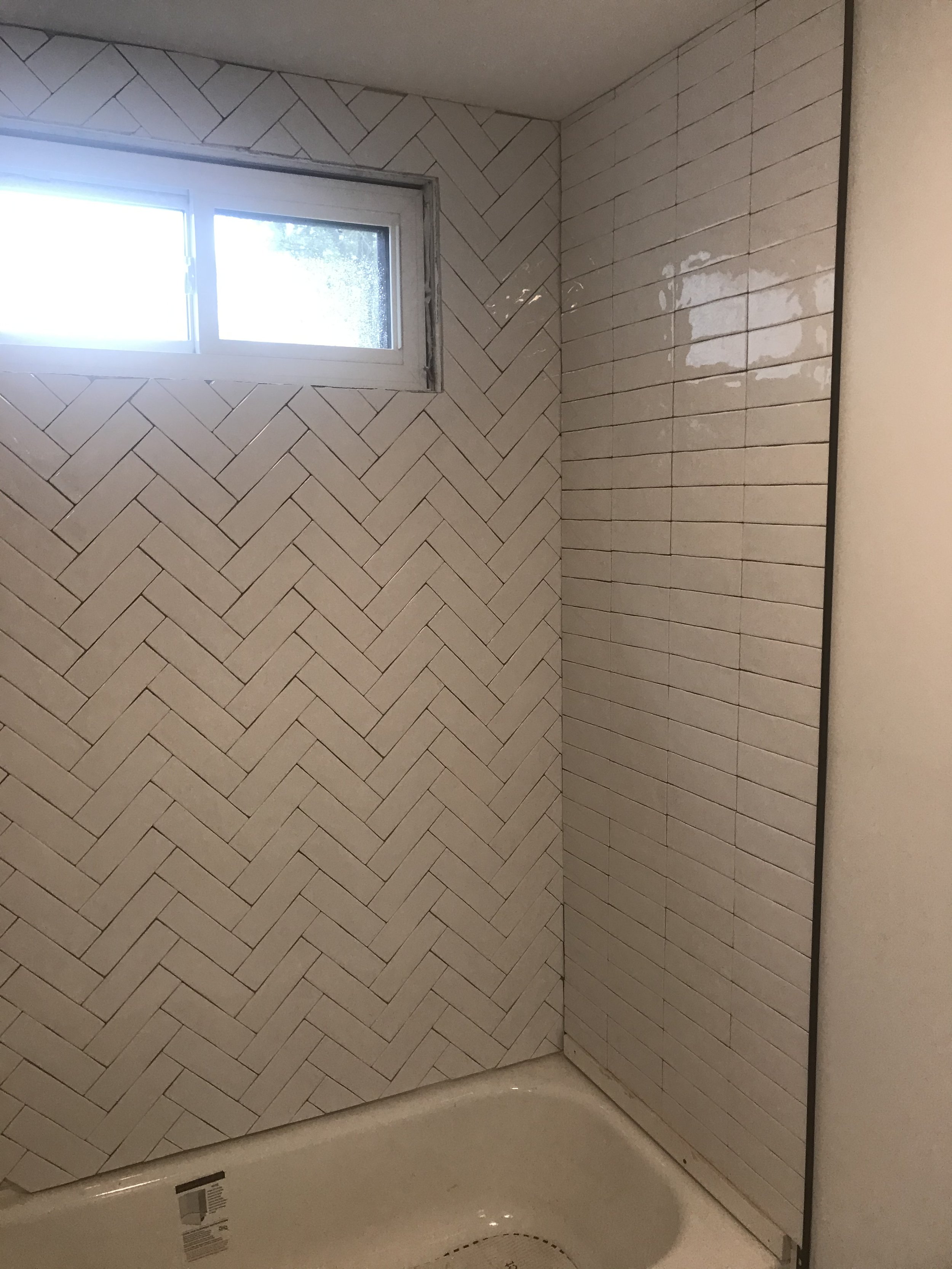 Shower Tile and Bathtub Installation in Process