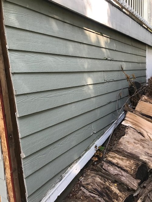 Before: Wood Siding Repair