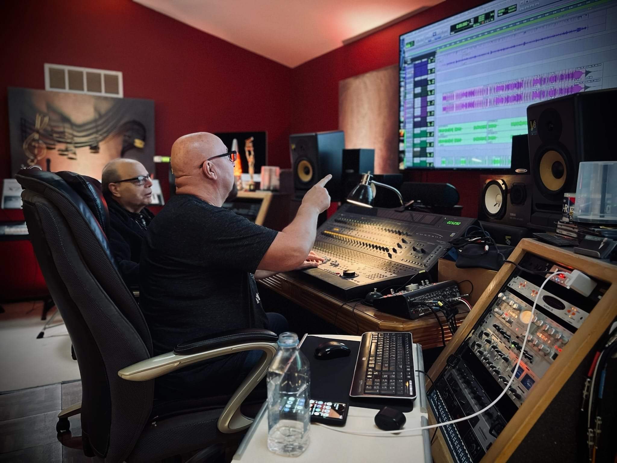 Robert J. Buhl and Robert A. Mackey at SONGWERKS MULTIMEDIA Studios discussing music edits.