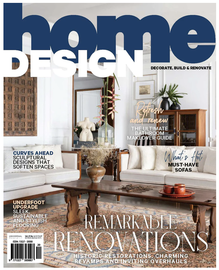 Contemporary abstract portrait painting 'Pensive' by Gina Ward, styled as a feature piece in a luxury residential interior for Home Design magazine.