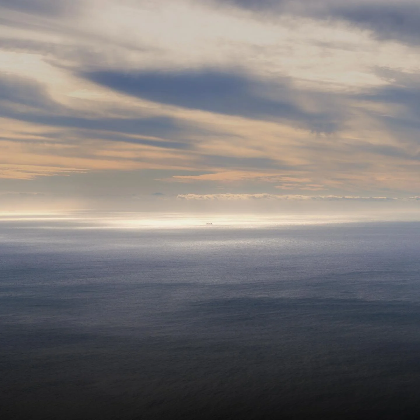 A ship illuminated by the late afternoon light off the western coast of South Africa. Old photo I discovered while going down memory lane with @delasarthe and @cynthiasilkmoth
