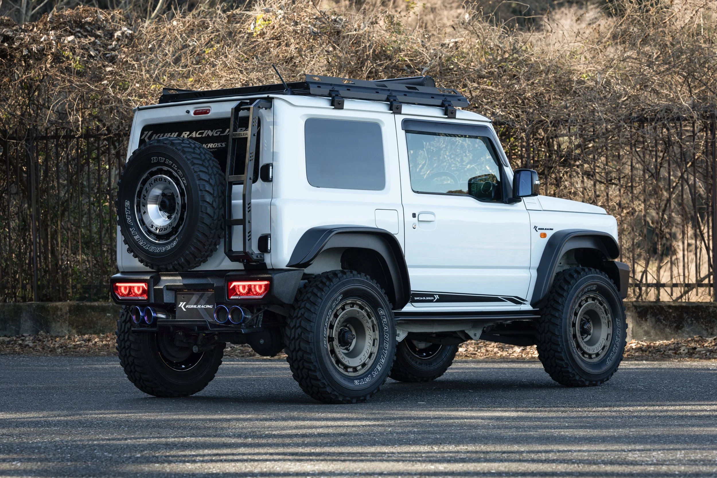 KUHL 74R-GT II Jimny Sierra rear three-quarter view showing wide fenders and rear aero