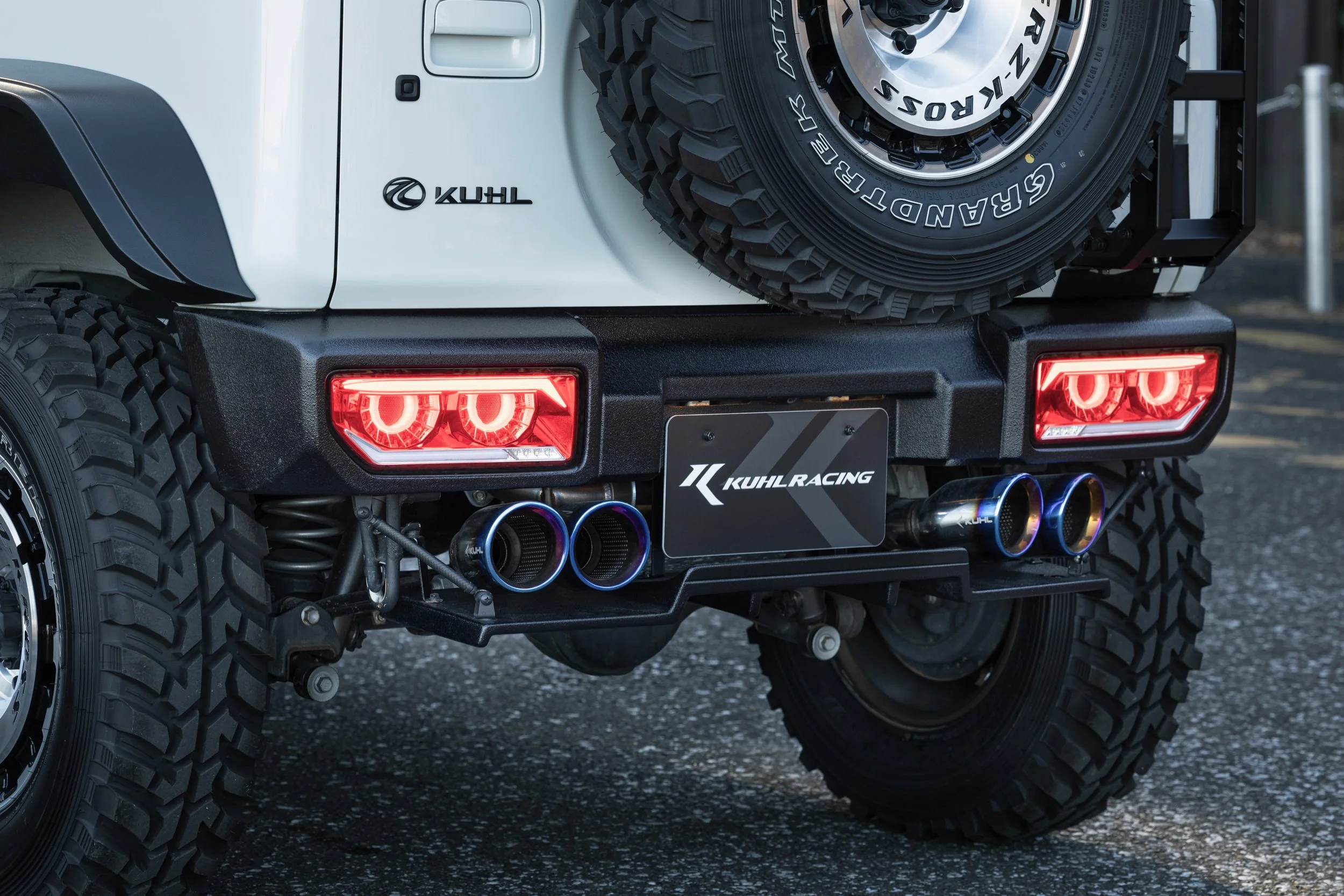 KUHL 74R-GT II rear aero detail showing rear bumper, diffuser and exhaust tips