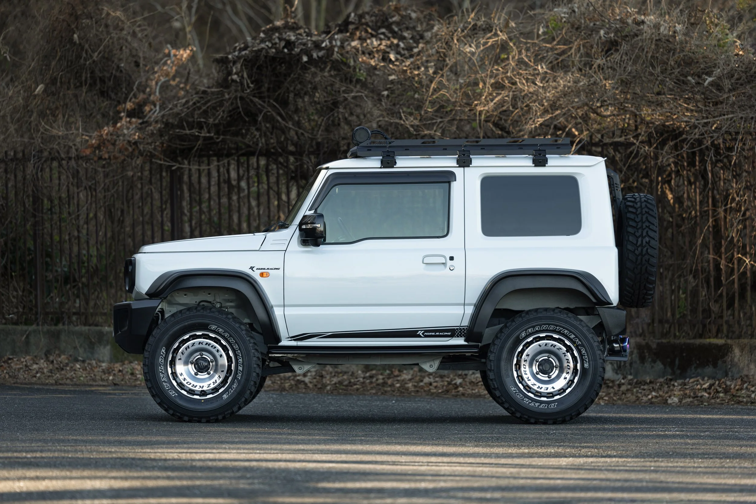 KUHL 74R-GT II Jimny Sierra side profile with side steps and replacement wide fenders