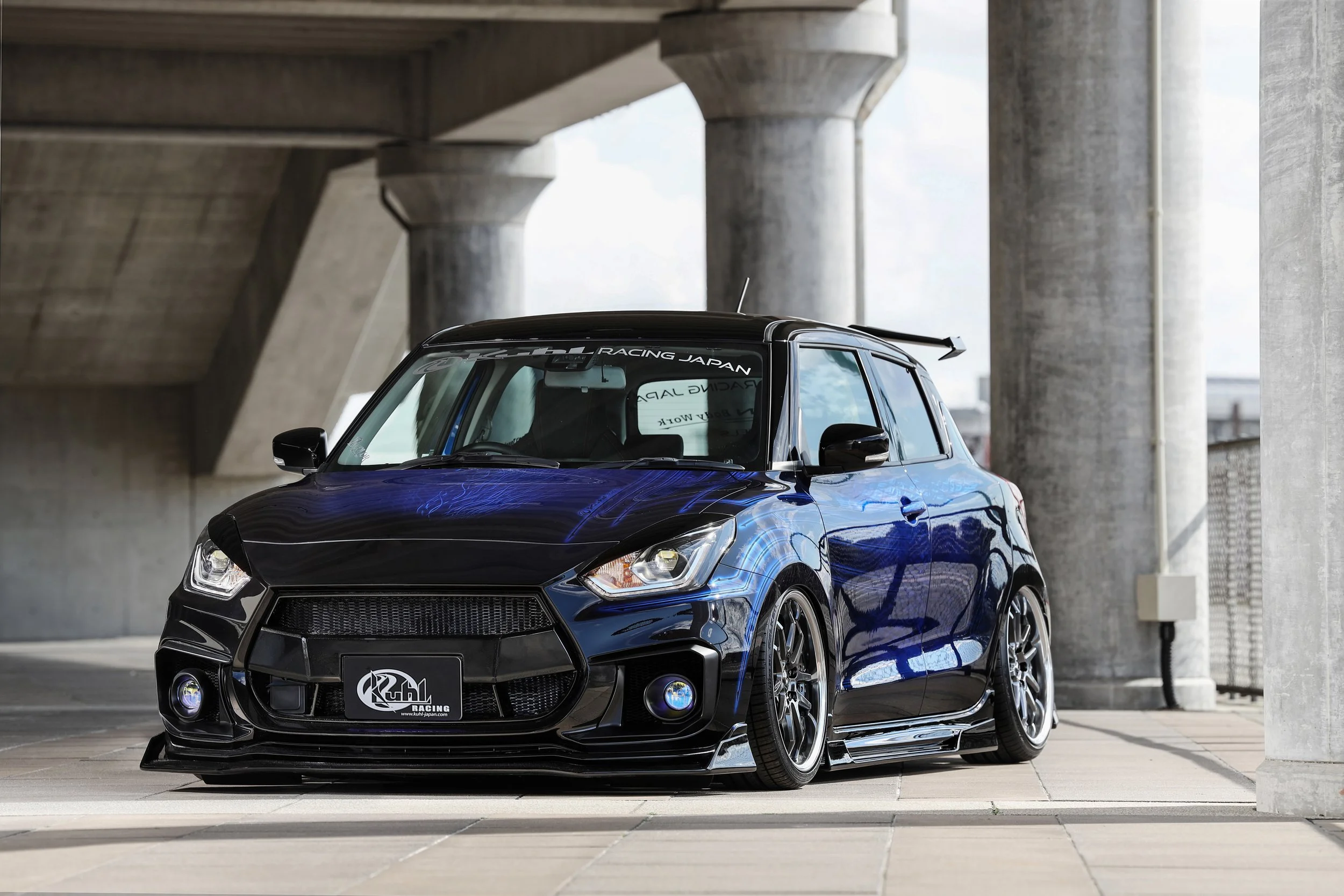 KUHL 33R-SS Suzuki Swift Sport ZC33S demo car, front three-quarter view with front diffuser, side diffusers and roof wing