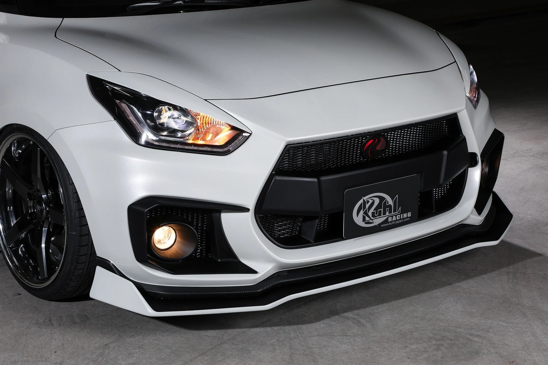 KUHL 33R-SS front diffuser, front grille and foglight covers on Suzuki Swift Sport ZC33S.