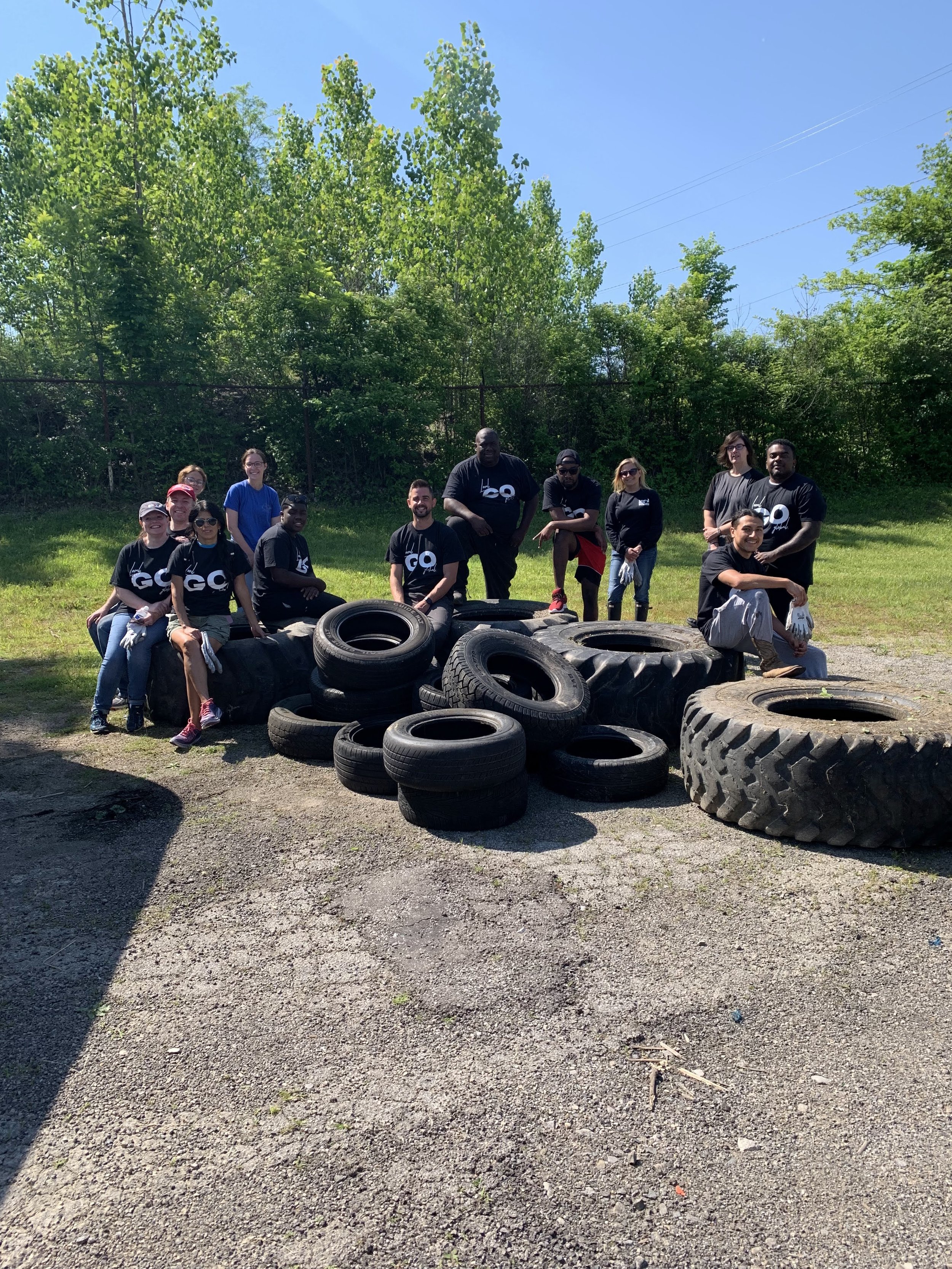 Sterling Field Group Photo with Tires.jpg