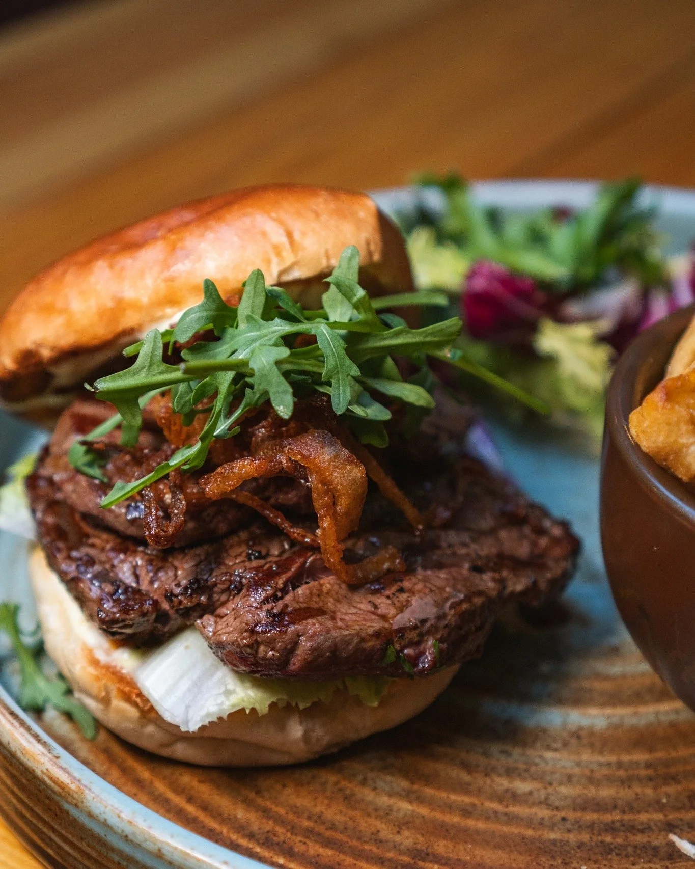 PTMY Steak Sandwich 🥩

Bistro rump steak with golden onions, mustard mayonnaise, sun-blushed tomatoes and rocket in toasted brioche, served with chips.

Join us for lunch this week 😉

Available Monday to Saturday 12pm to 5pm

 #nefoodies #morpethfo