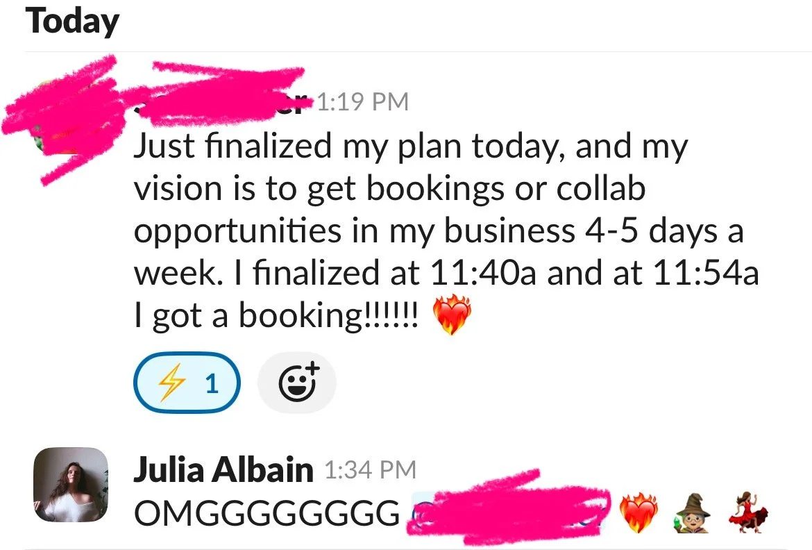Screenshot of a messaging app conversation showing a woman’s message about finalizing her business plan and securing a booking. Julia Albain’s reply is a text saying "OMG" with a pink scribble, heart, and dance emojis.
