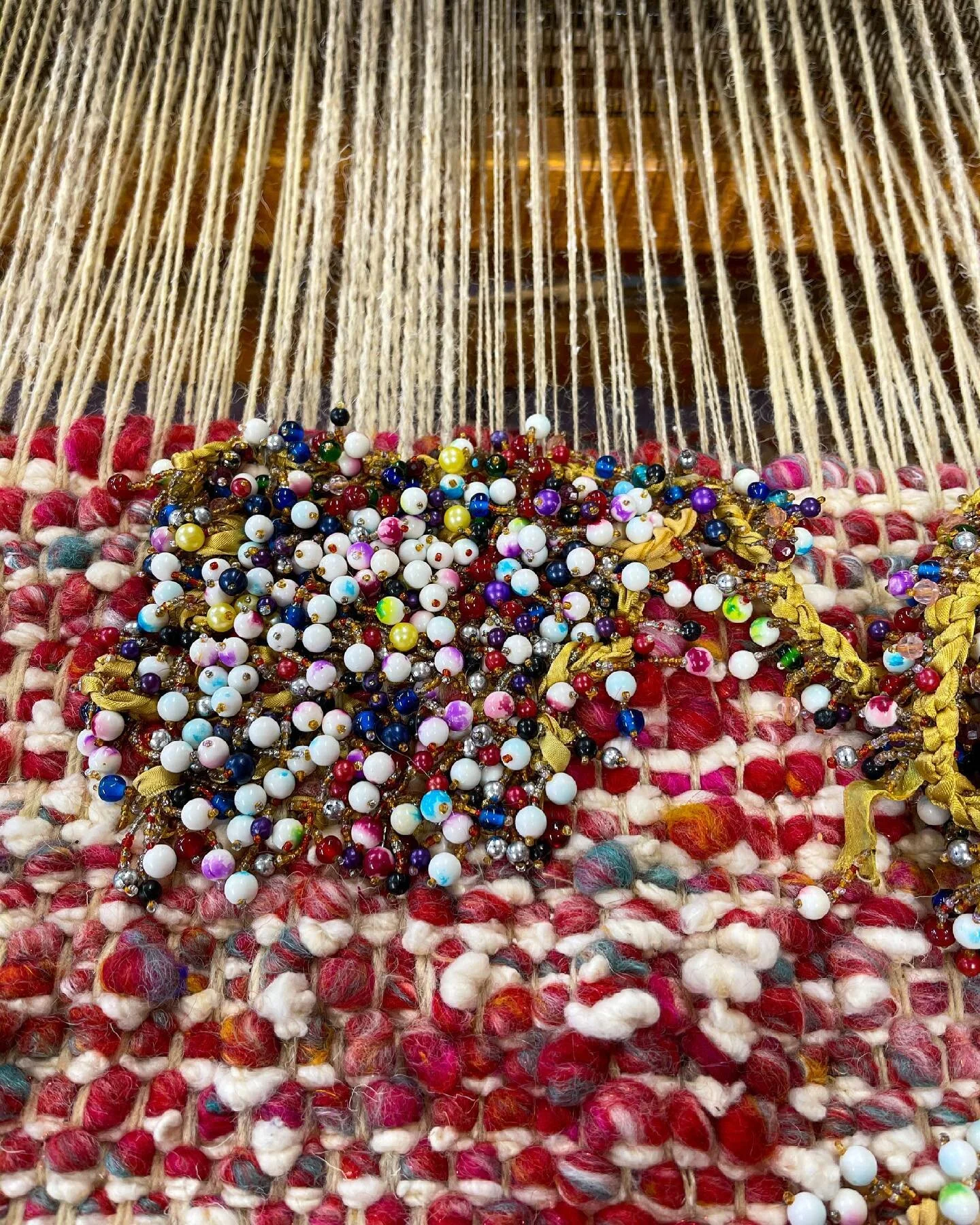 Returning to this piece today after a long hiatus. Working on it bring me so much happiness. The beadwork is really coming together. The hand spun @supima is a beautiful and brilliant foundation. Slow and steady.