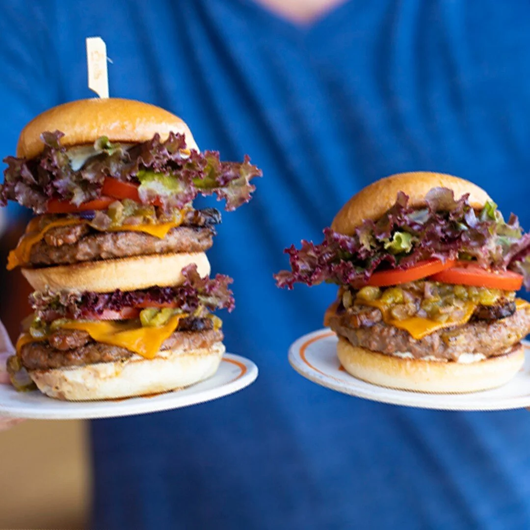 🏔 🏔 🍔 🍔 Introducing the MILE HIGH and 1/2 MILE BURGERS!!!! For those seeking greater heights, the MILE HIGH is a challenge we want to see on IG&mdash;send us your pics or vids! Both of these are stacked with Green Chiles on a Green Chile Beyond B