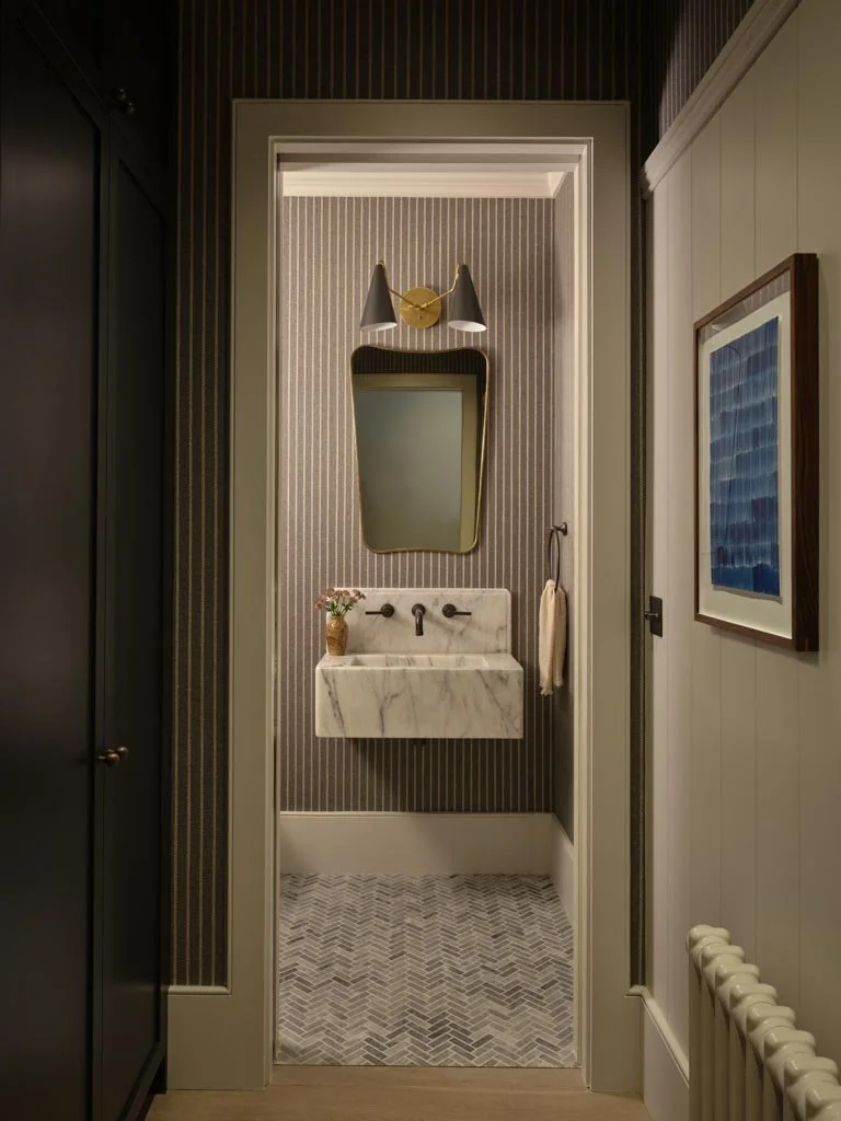 Elegant marble bathroom in London townhouse