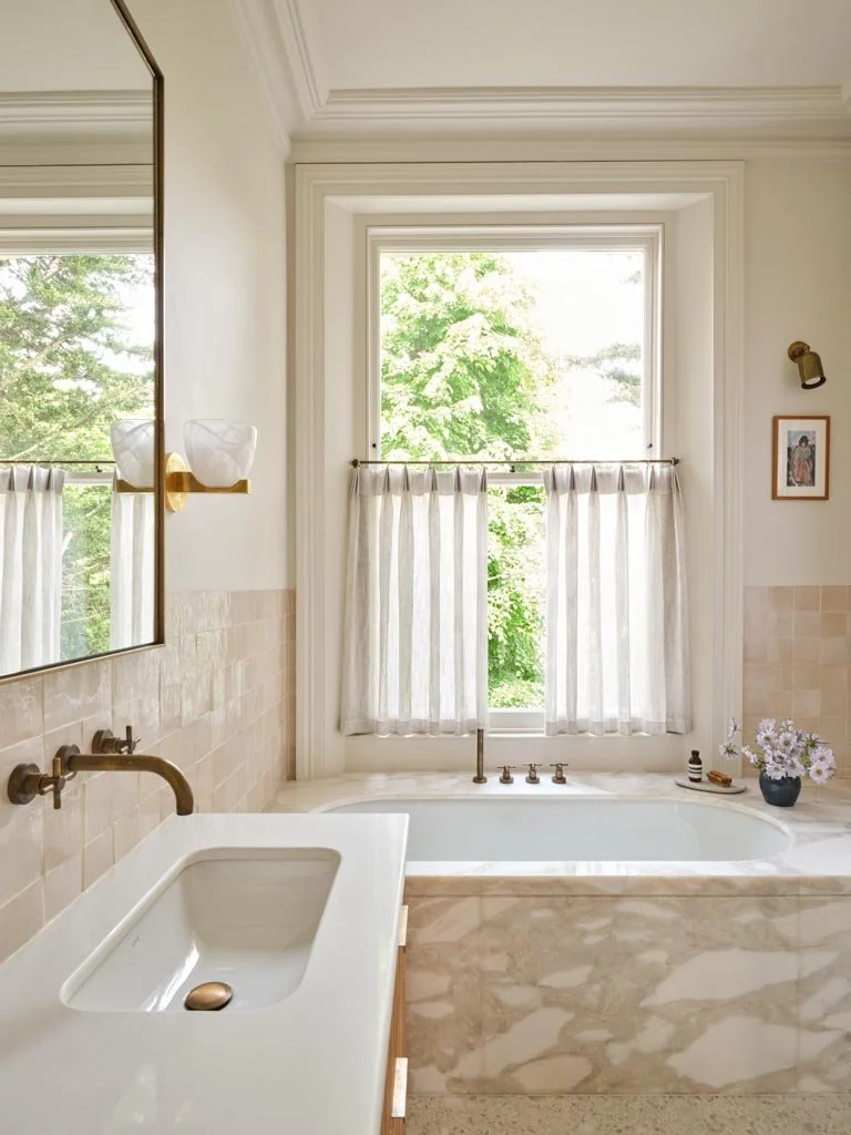 Built-in bath with period windows