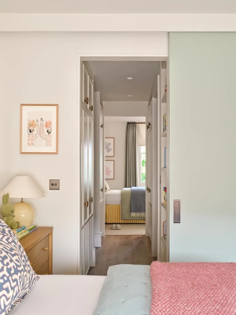 Serene bedroom in London townhouse with soft neutral palette