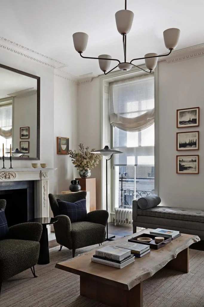 Light-filled living room with period fireplace