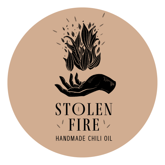 Illustrated hand holding flames for Stolen Fire Handmade Chili Oil logo