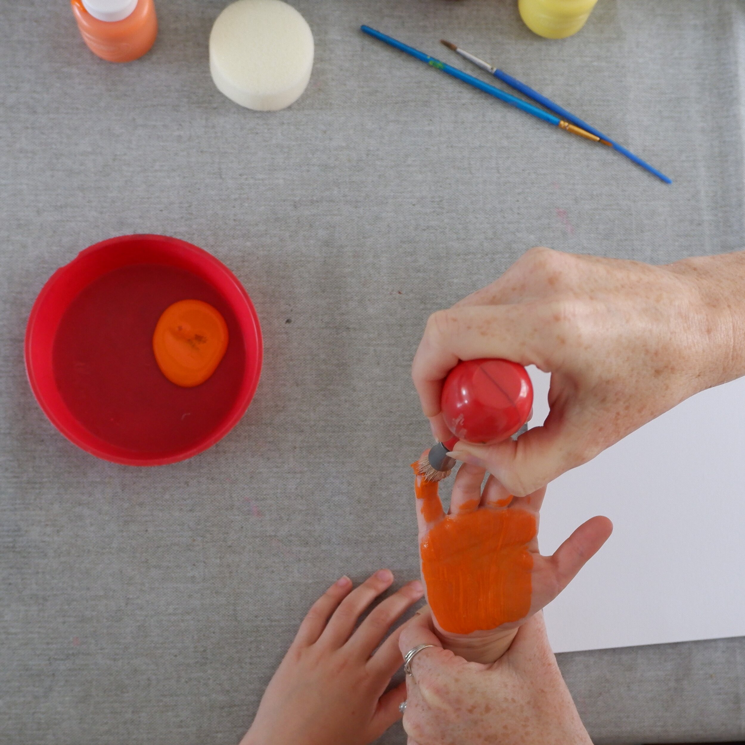 Step 5 paint childs hand with paint handimal 2.jpg