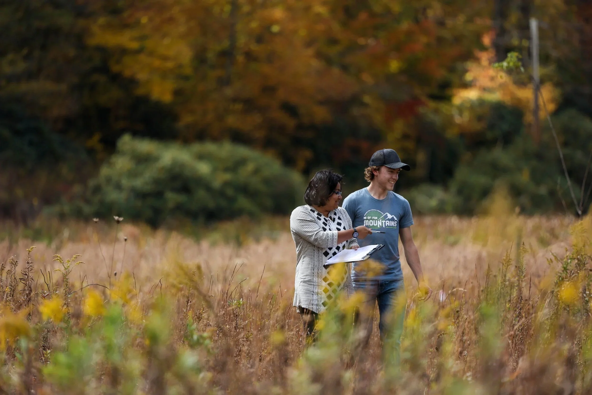 Dr. Shinjini Goswami walks with a student
during a pollinator survey at the Elk Valley
Preserve.