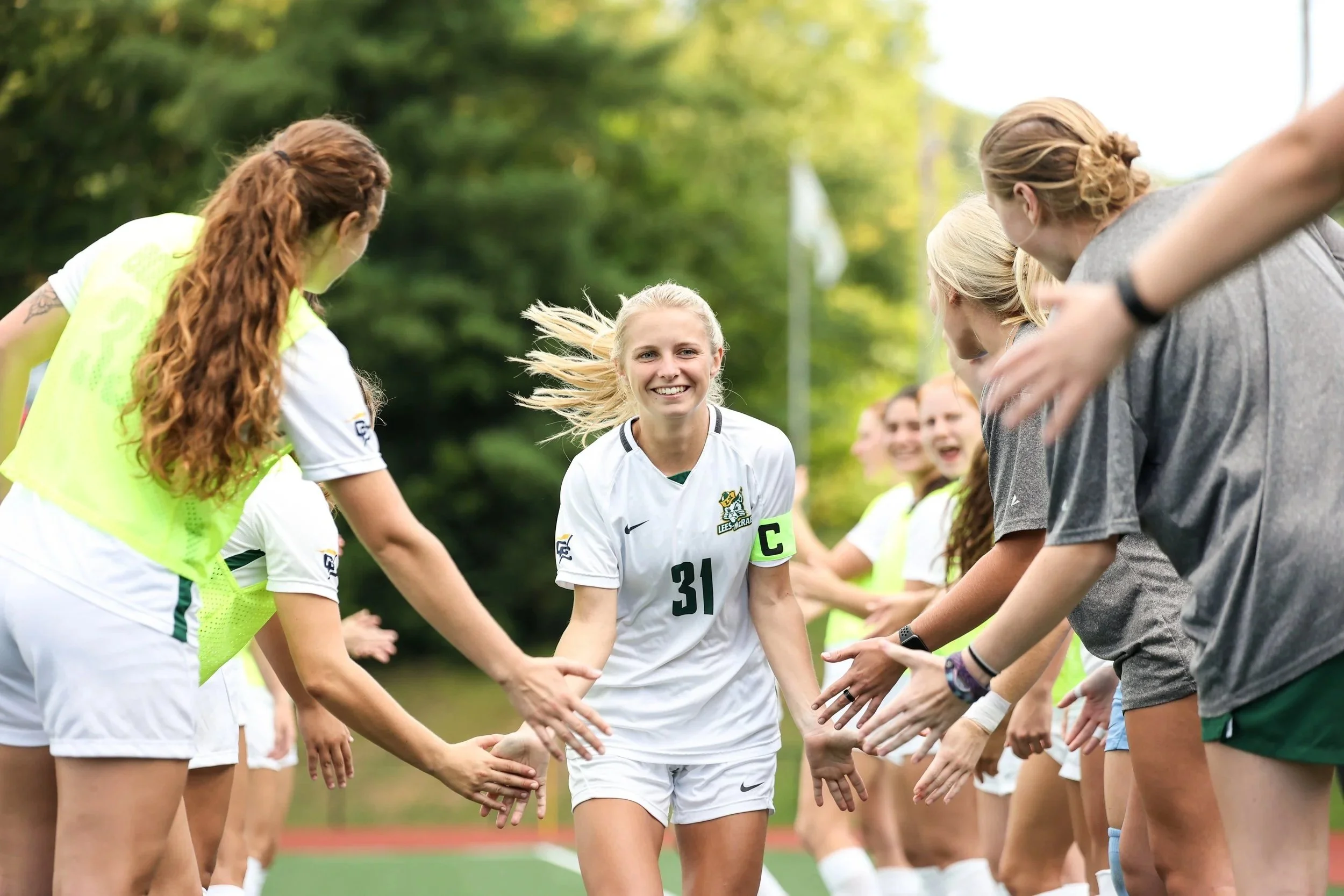 Averee Andrews, captain on the women's
soccer team, runs down the player tunnel
during starting lineups ahead of the Bobcats
opening match against Lenoir-Rhyne
University.