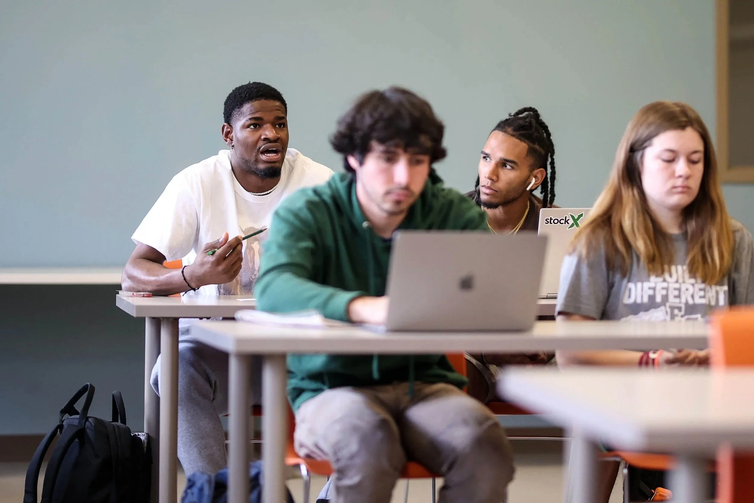 Williams Onyeodi shares his thoughts during
a history class in the May School of Natural
and Health Sciences.