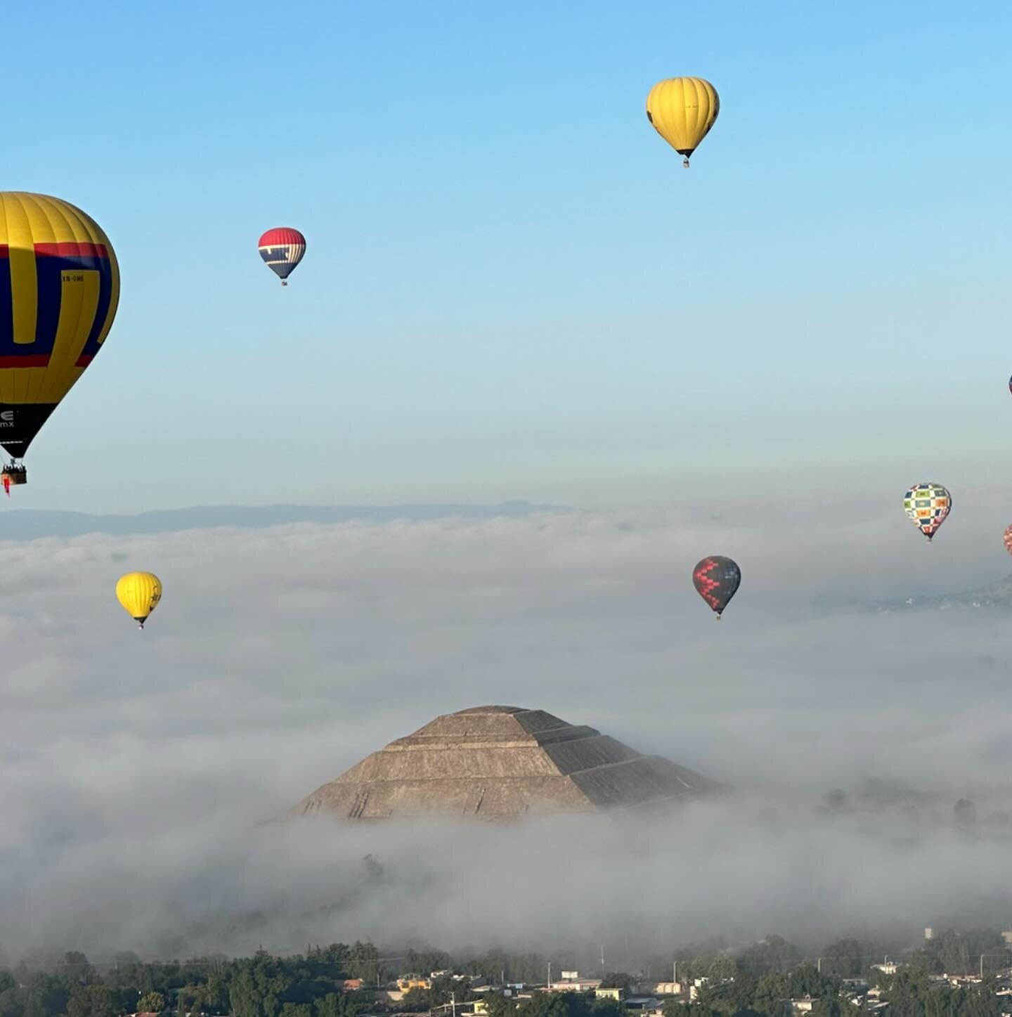 Floating above the clouds, looking down on 2000 year old pyramids. This is a must for experience in Mexico City. 
#luxurytravel #virtuosotravel #fourseasonshotelsandresorts