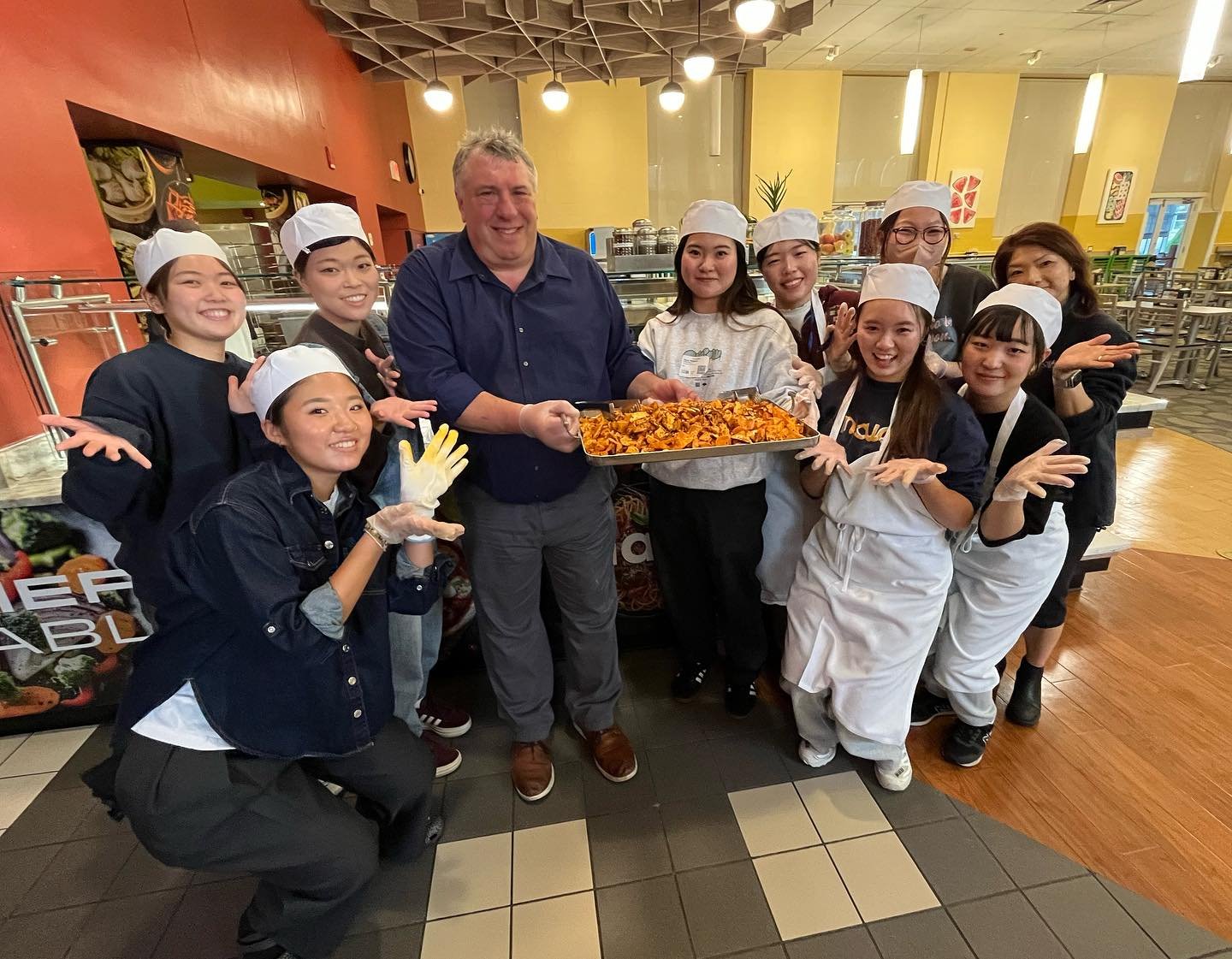 Students in our Food Committee Club partnered with @showabostondining to make daigaku imo for dinner service. Daigaku imo is a sweet potato dish that is popular in Japan, made by frying sweet potato, coating them in a sweet soy sauce, and topping wit