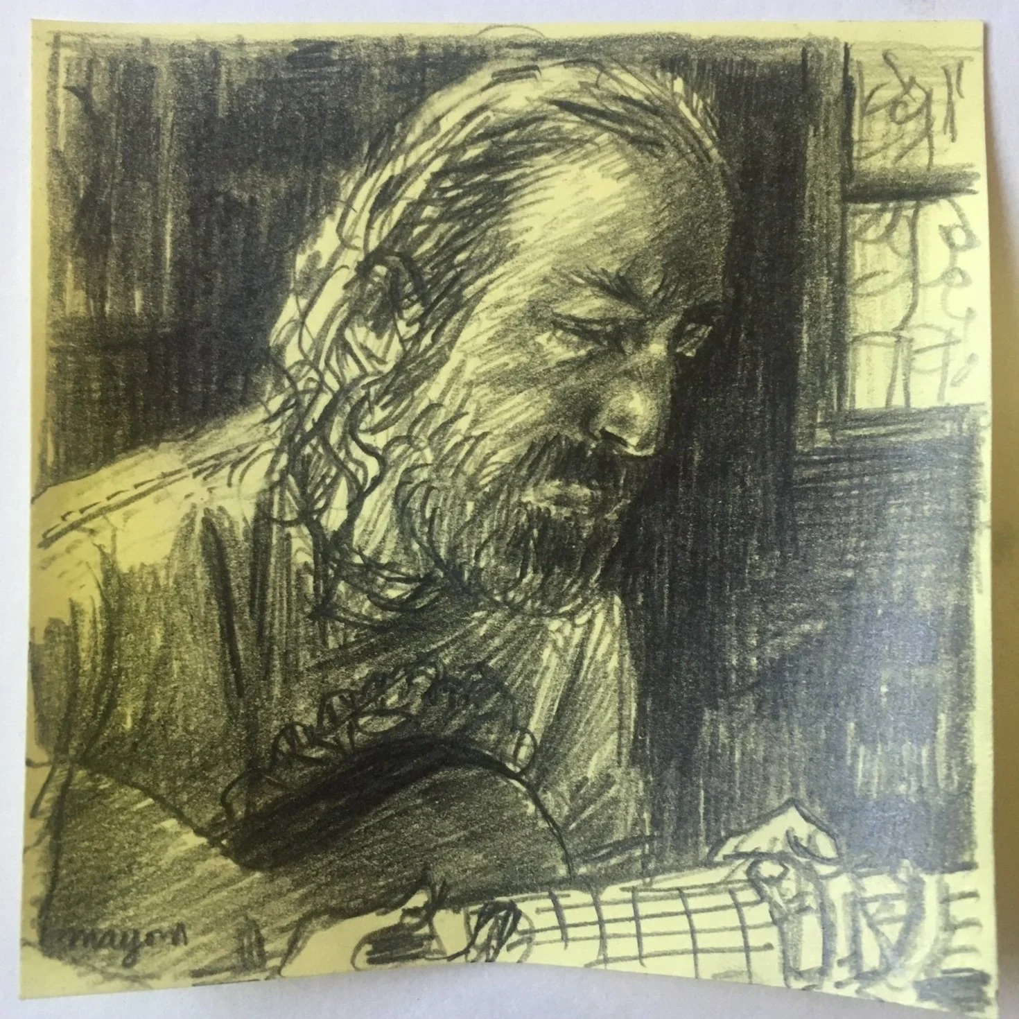Black and white sketch of a man with a beard and glasses, playing a guitar, with detailed shading and line work.