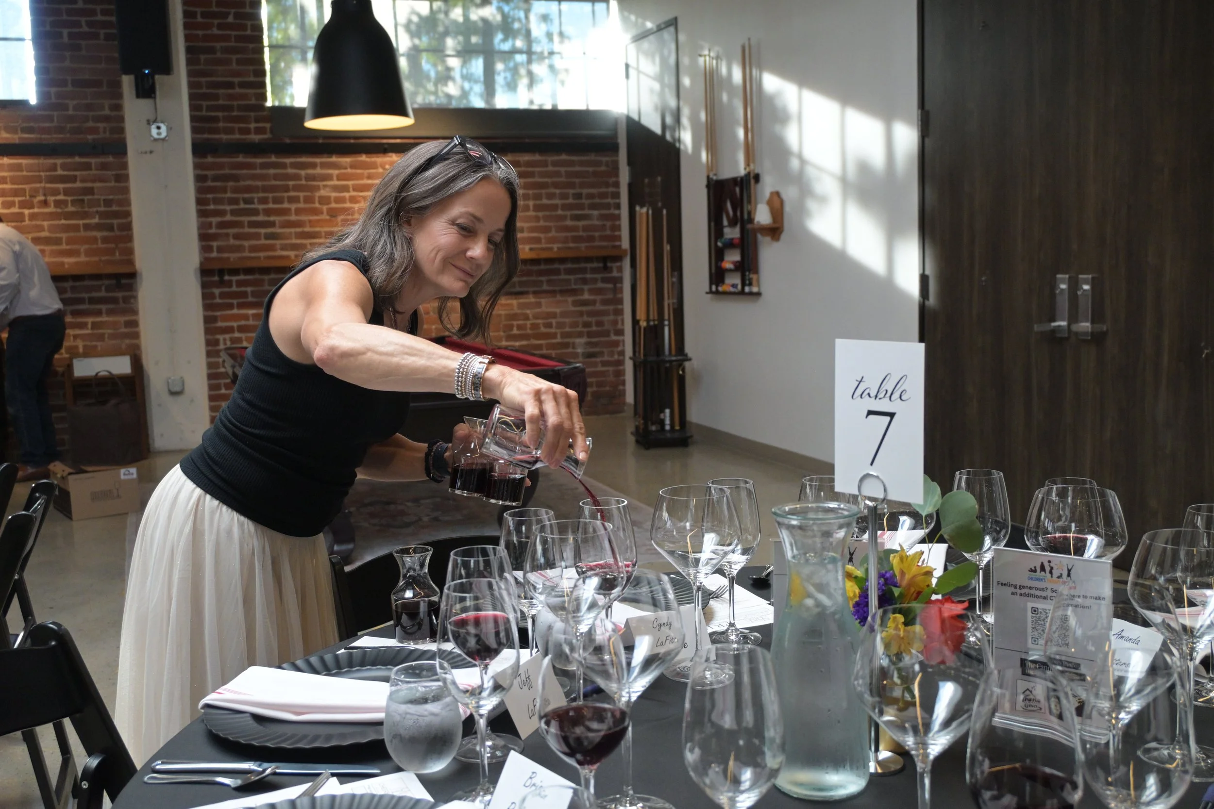 Gina pouring wine.JPG