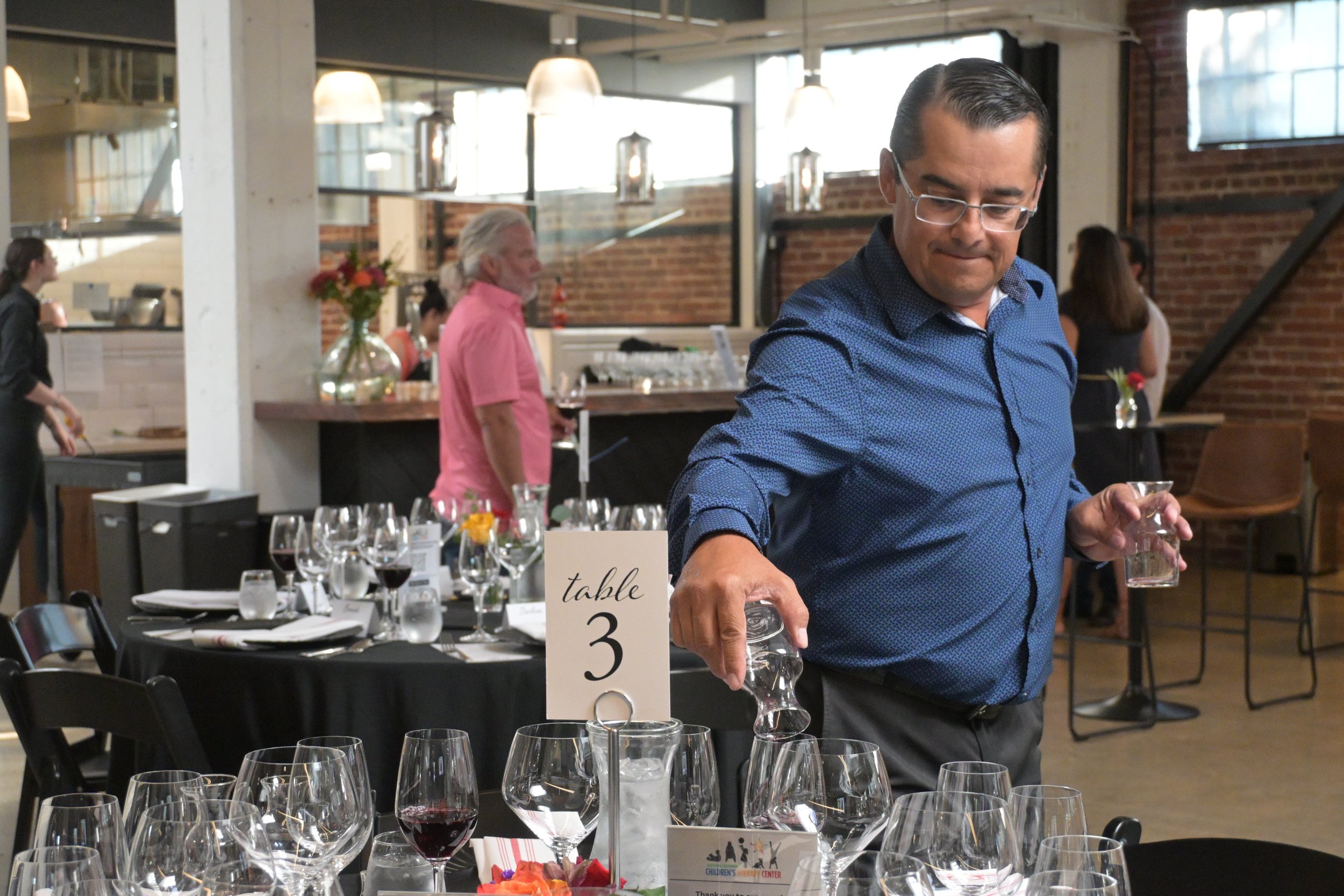 Jon pouring wine 2.JPG