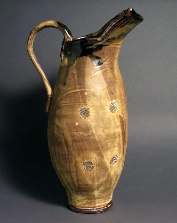 Coil Pitcher by Elizabeth Mae Renfrew

Coil Pitcher with Yellow Salt Soda Fired 18&rdquo; x 6&rdquo;

Elizabeth is an intuitive artist. Creative energy moves through her into everything she touches. Exploring the self in relation to the world through