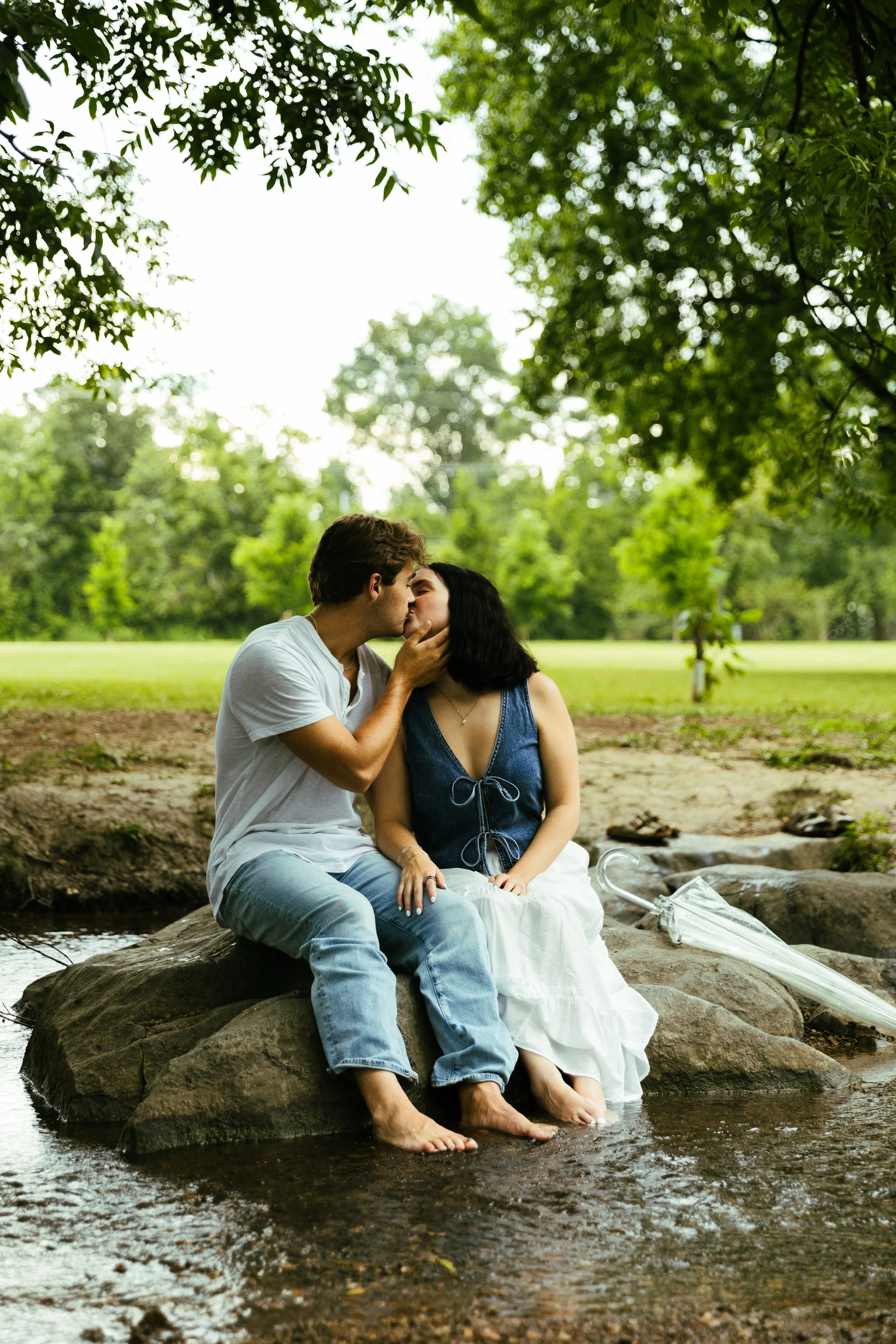Couple kidding in a creek
