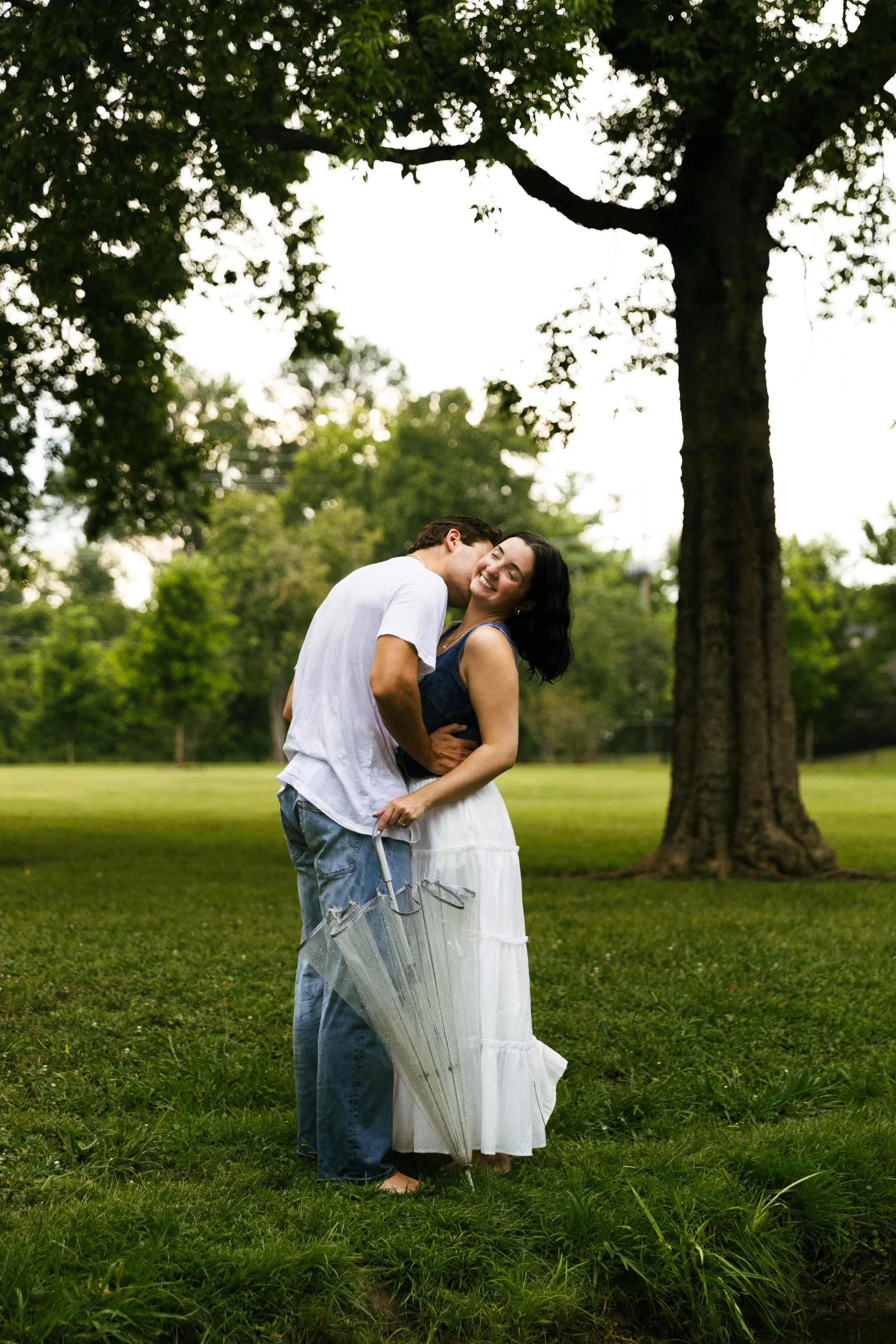 Man kissing woman on the cheek