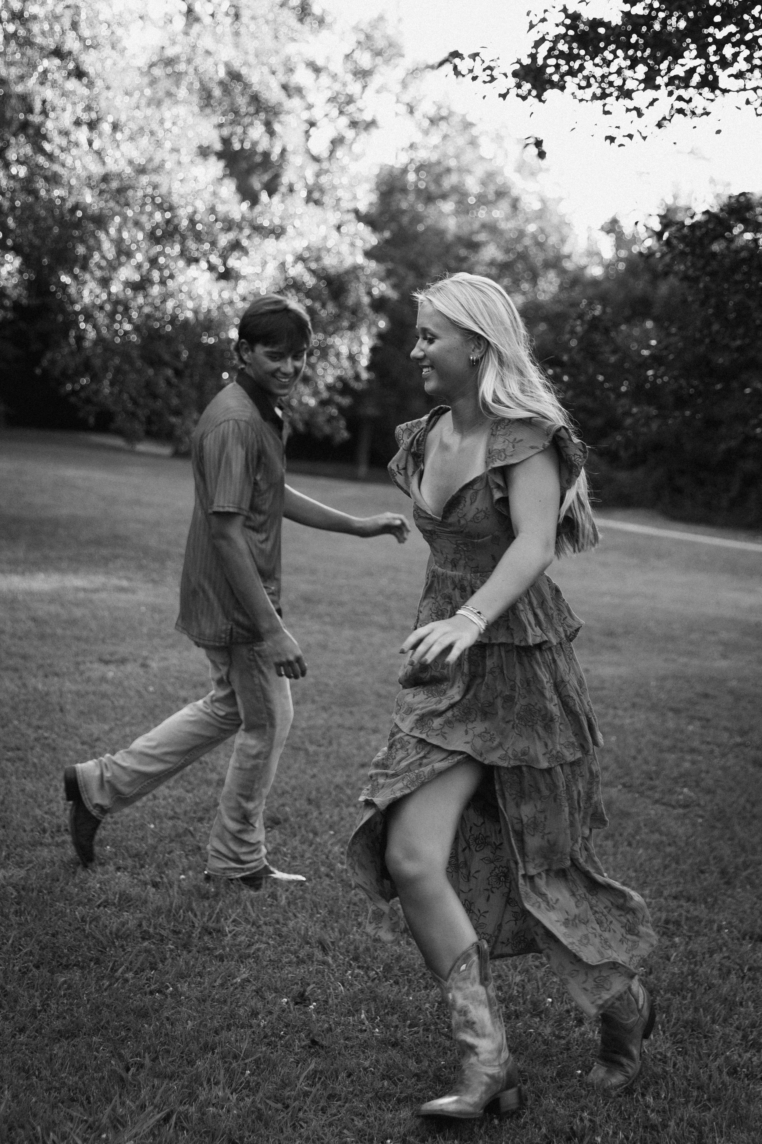 Couple chasing each other laughing