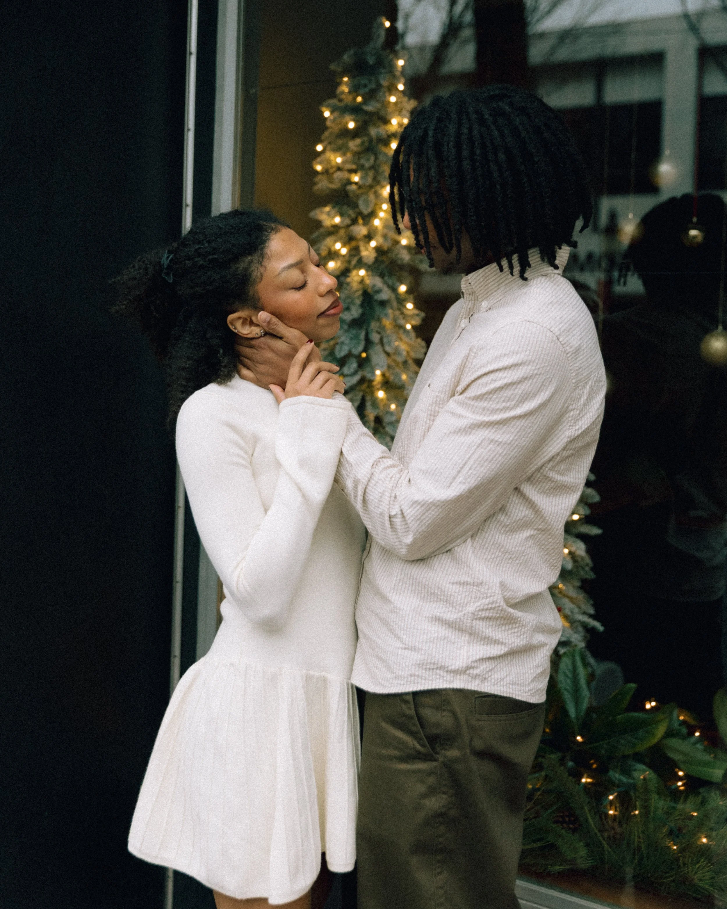 Couple embracing each other during christmas