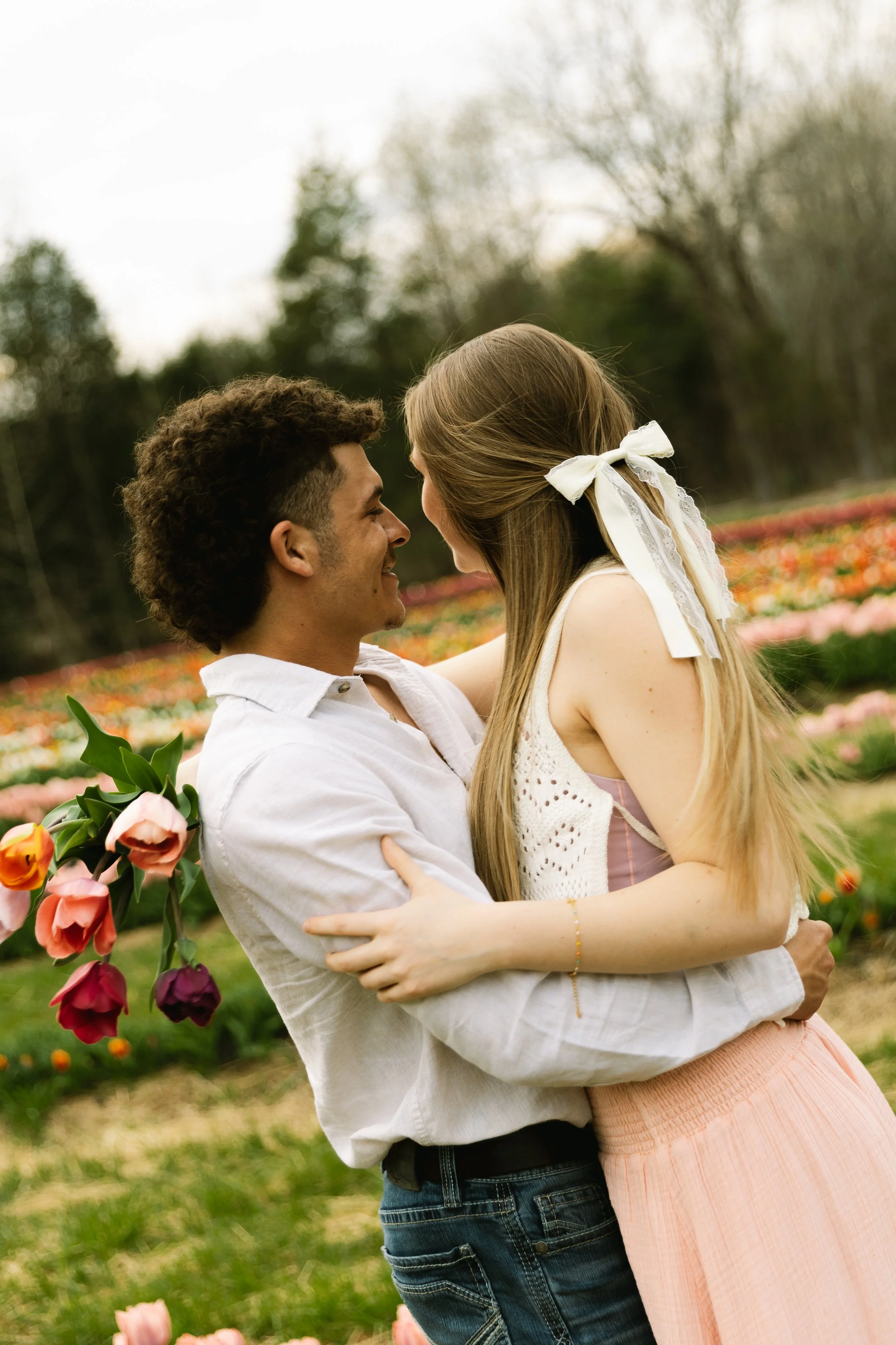 Couple in a tulip farm