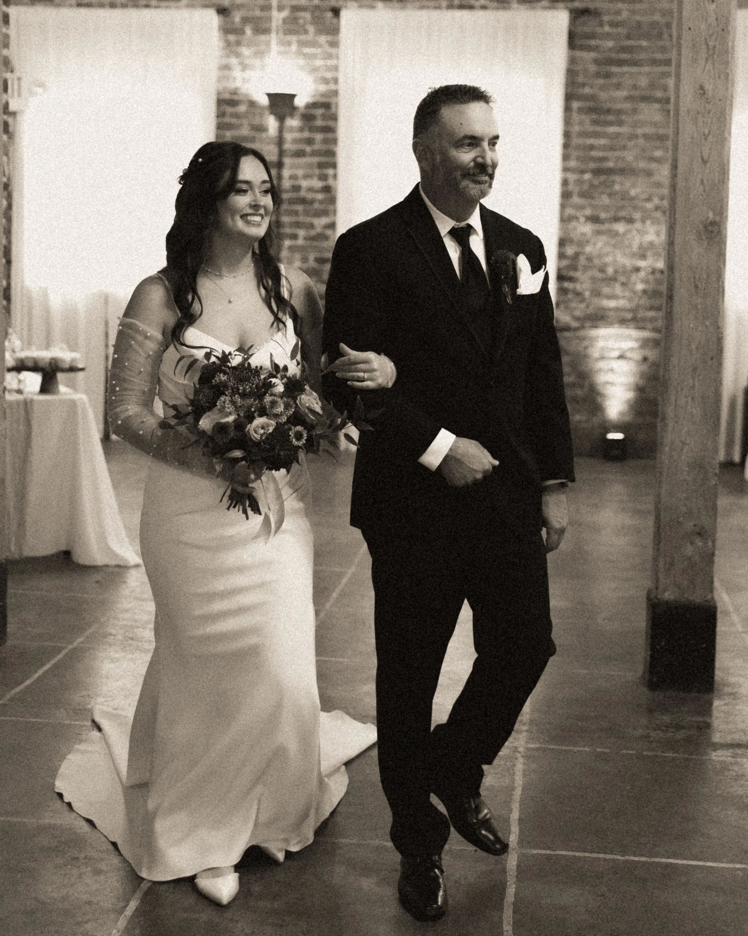 Father walking bride down the aisle