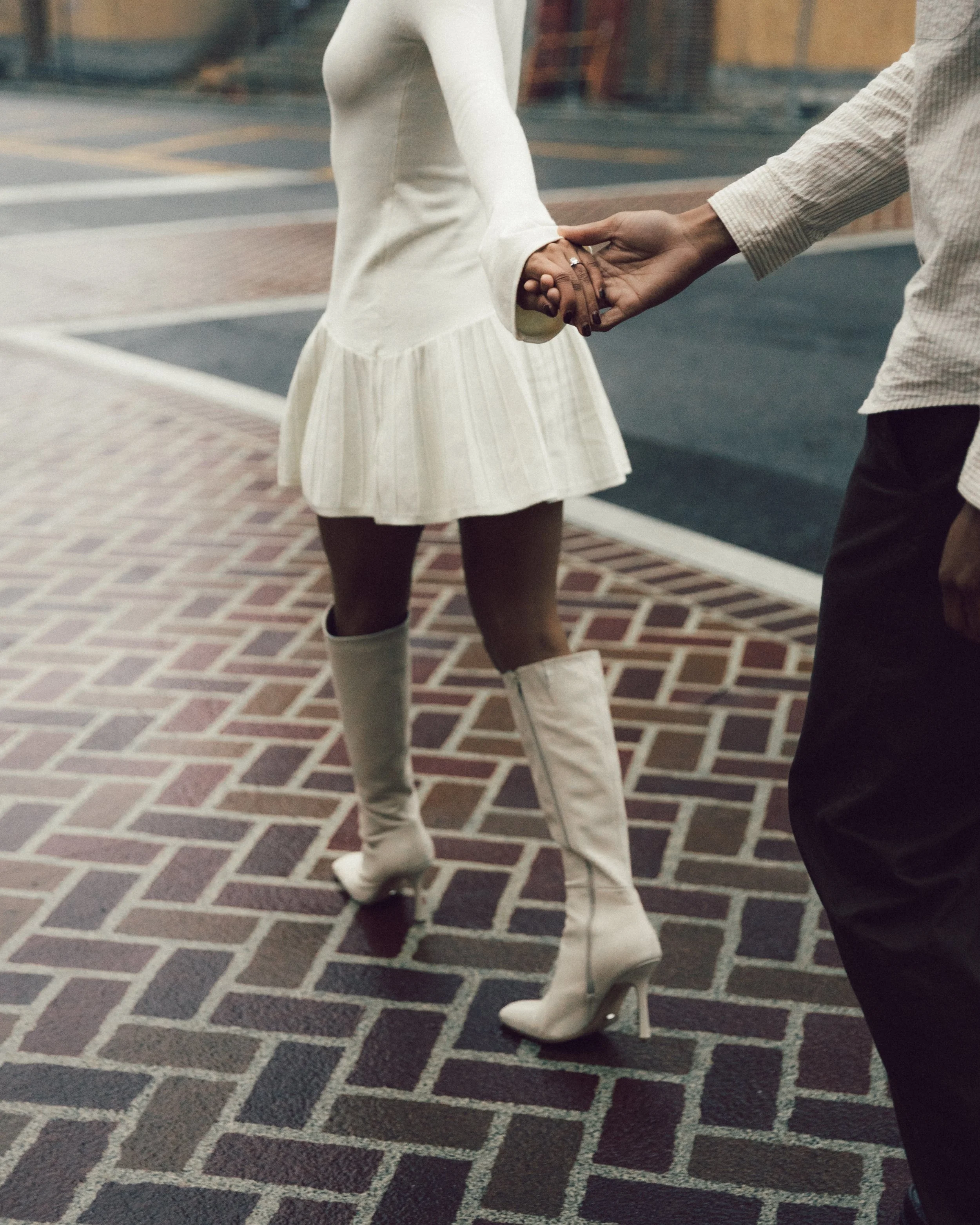 Couple crossing the street