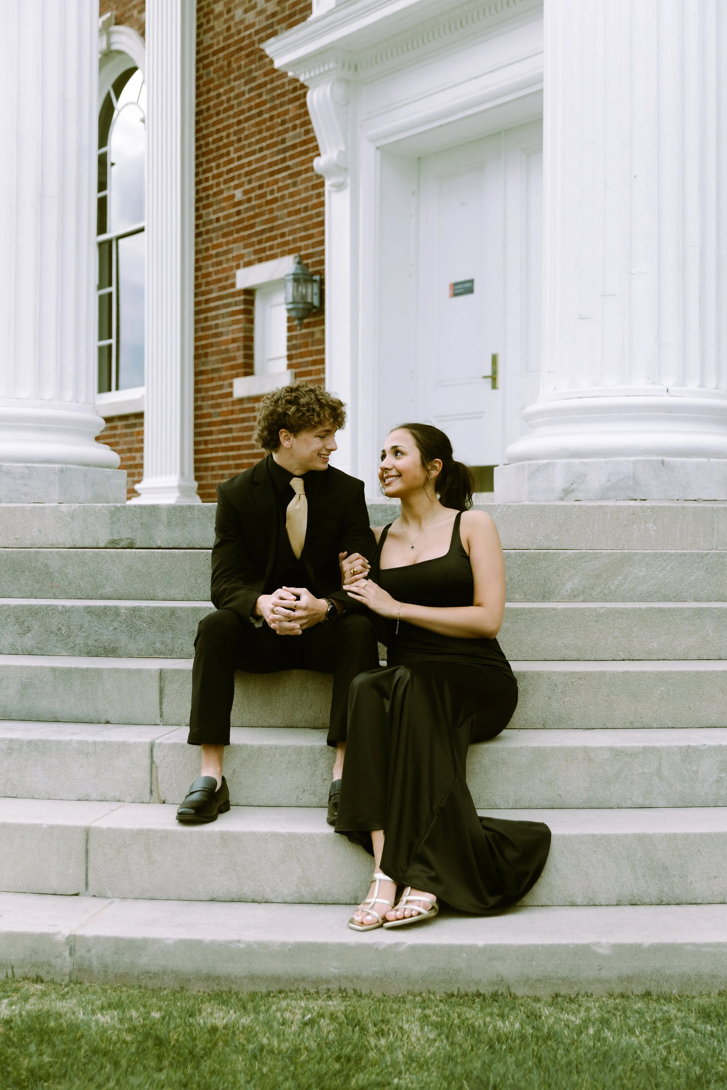 Couple wearing prom clothes