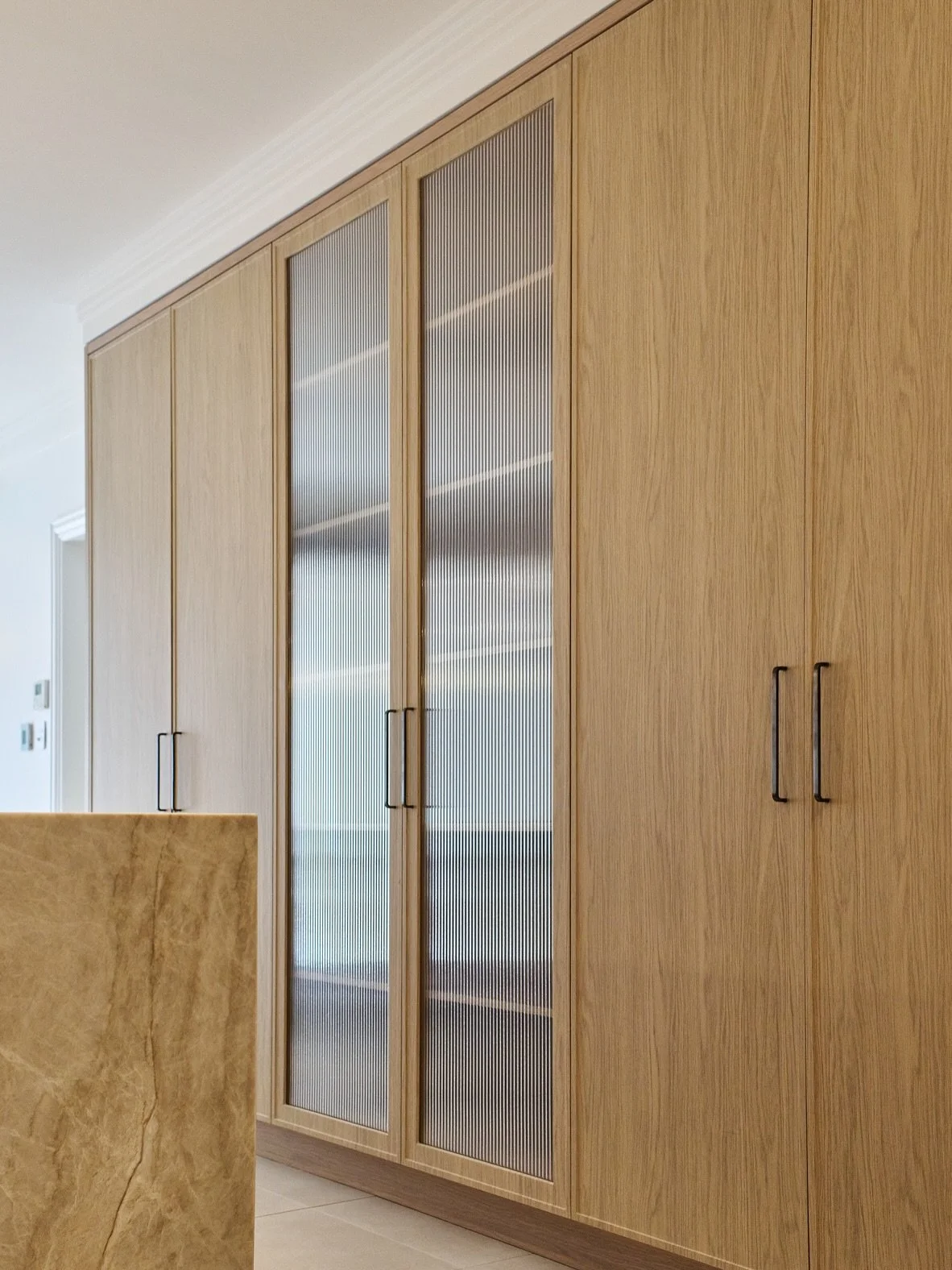 Joinery / Cabinetry / Pantry Design

What looks simple on the surface is actually a series of very deliberate decisions.

My client wanted a dedicated space for her glassware, so we designed cabinetry that both stores and showcases. 

By introducing 