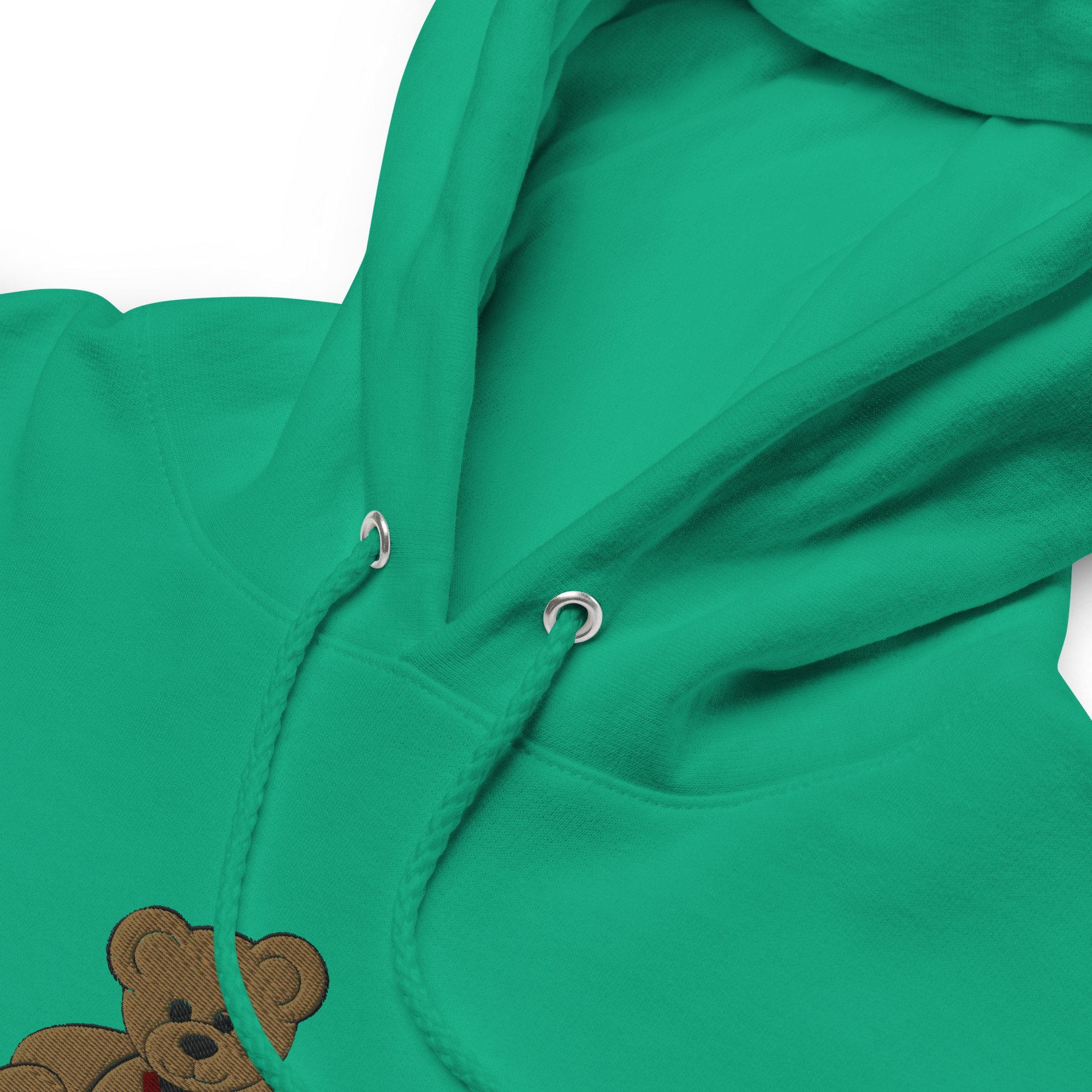 Close up of Kelly green hoodie with a teddy bear embroidered onto the front- made by go cozy