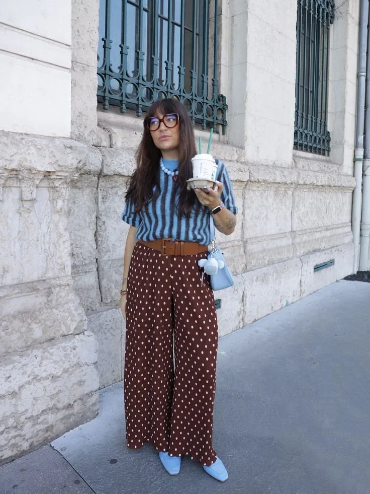 brown and white polka dot pants with a blue and brown striped tee outfit